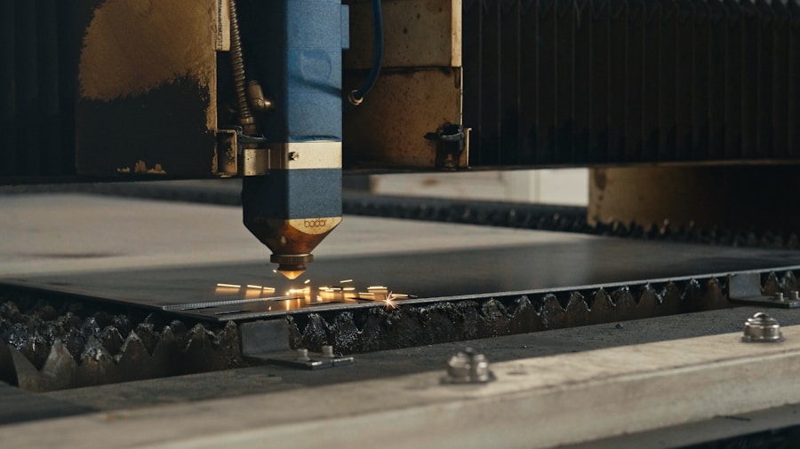 CNC laser cutting machine precision-cutting a sheet of metal